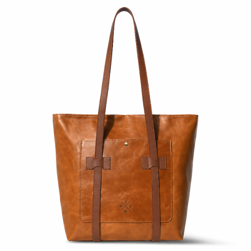 Brown leather tote bag with a visible brand logo on a white background
