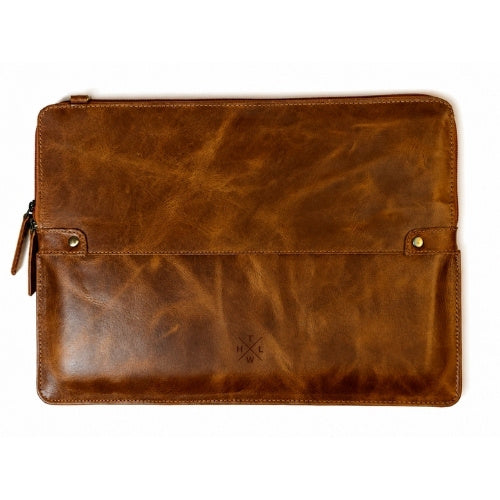 A brown distressed leather laptop sleeve with a front flap pocket, brass snap buttons, and a zipper closure, shown flat on a white background.