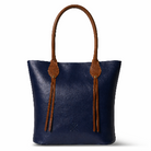 Navy blue tote bag with brown leather handles and straps on a white background