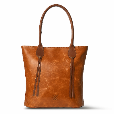 Brown leather tote bag with tassels on a white background