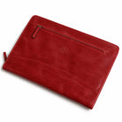Angled red leather portfolio with zippered pocket.