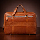 Brown leather briefcase on a dark brown background