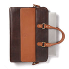 Brown leather laptop bag  with a visible brand logo on a white background