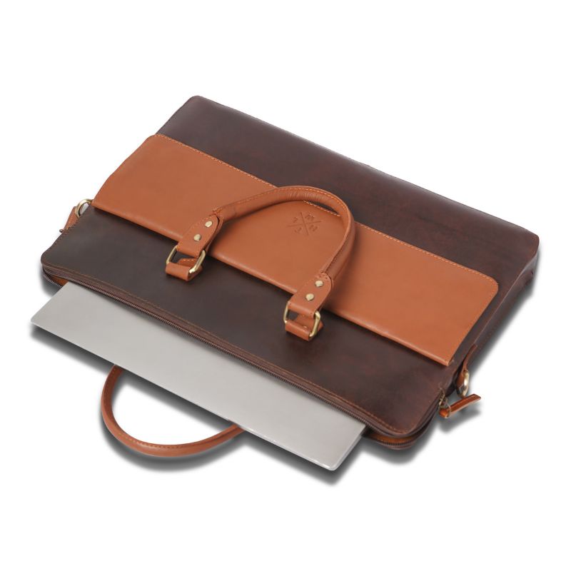 Brown leather laptop bag  with a handle on a white background