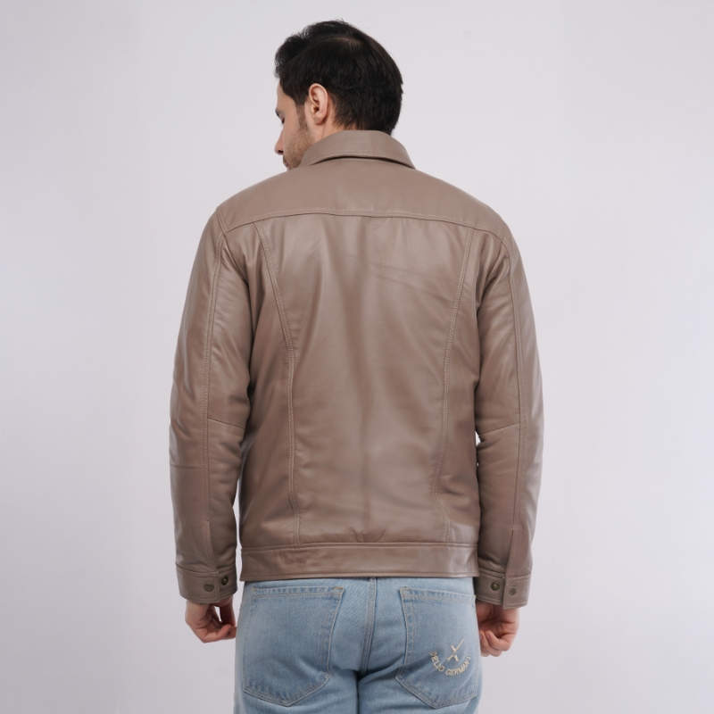 Man wearing a brown leather jacket on a white background