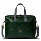 Green leather laptop bag with shoulder strap on a white background