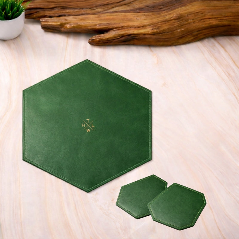 Hexagonal green placemat with coasters on a wooden surface