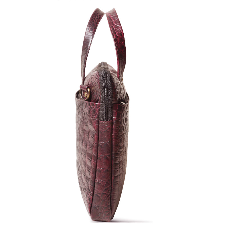 Brown leather handbag with a textured pattern on a white background