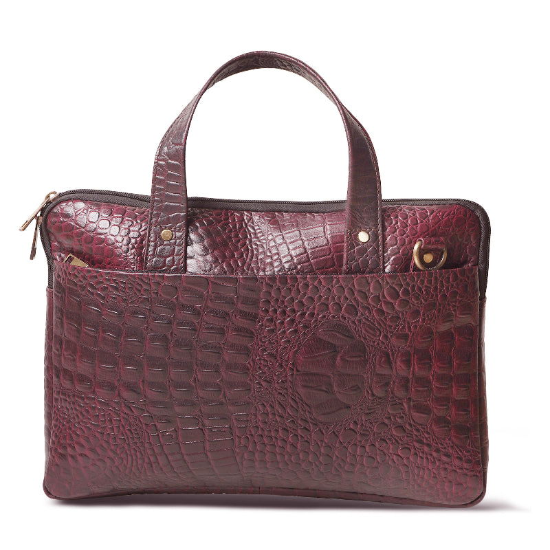 Maroon crocodile-patterned leather briefcase on a white background