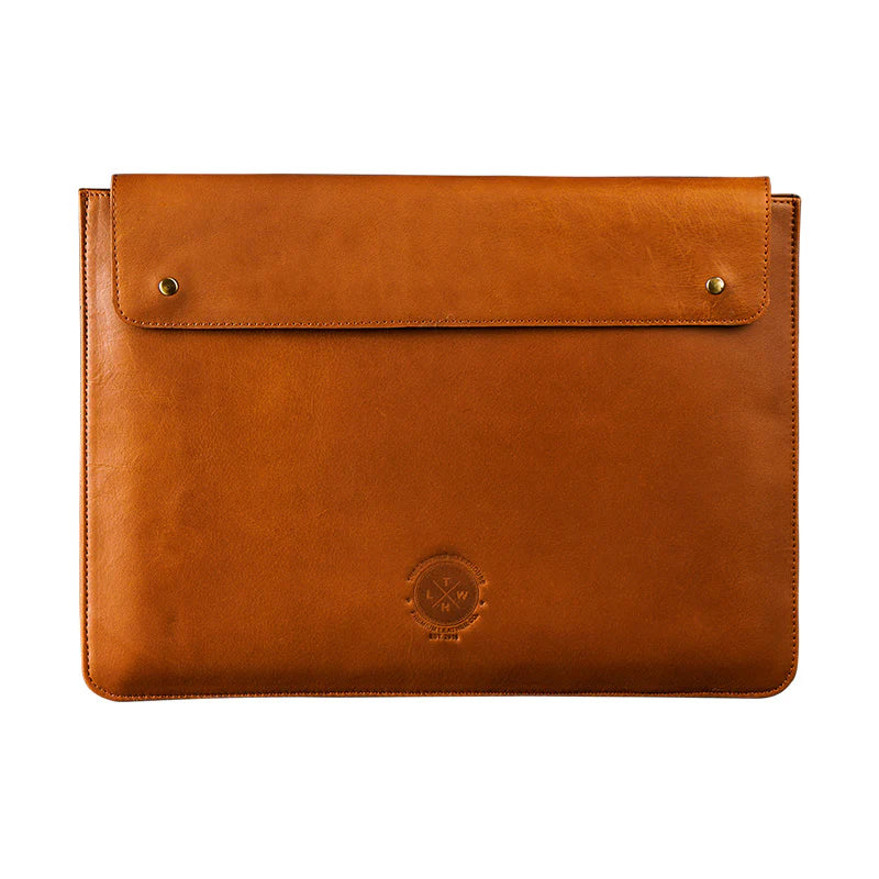 Brown leather laptop sleeve with a brand logo on a white background