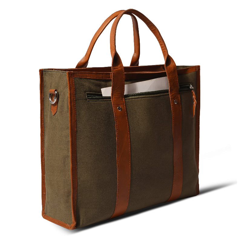 Brown tote bag with leather straps on a white background