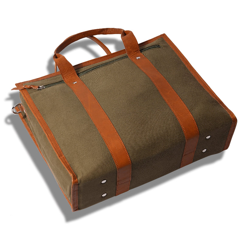 Brown bag with leather straps on a white background
