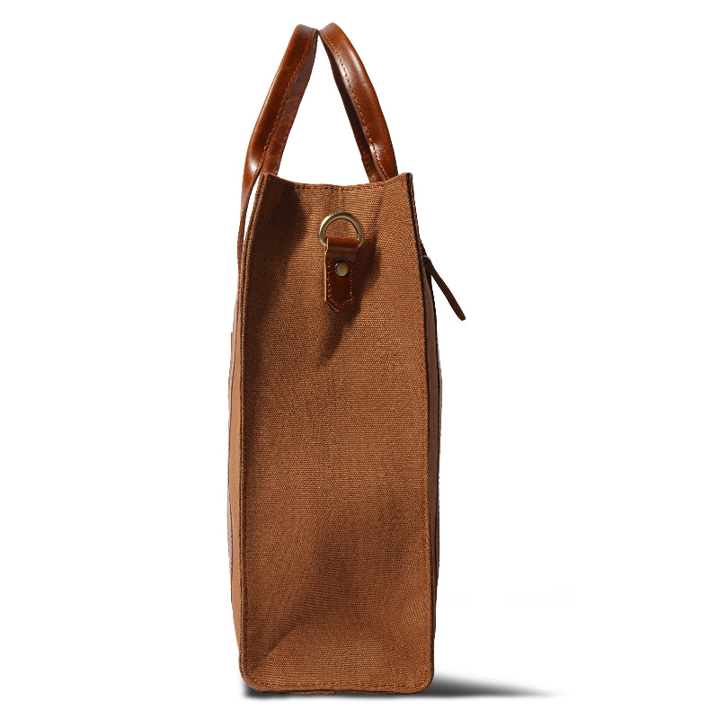 Brown leather tote bag with a handle on a white background