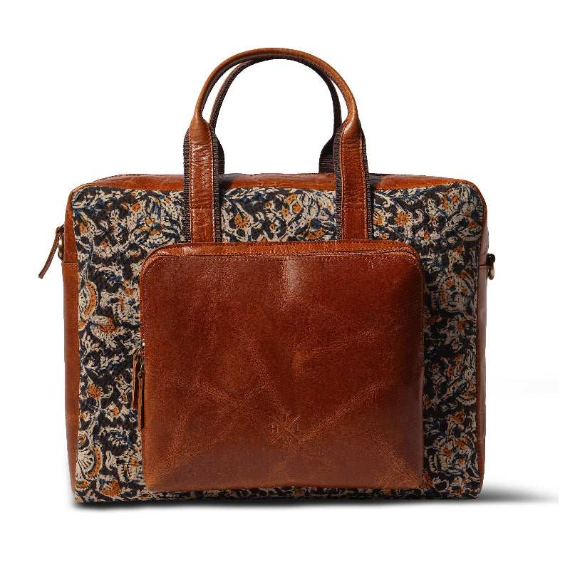Brown leather briefcase with floral pattern on a white background