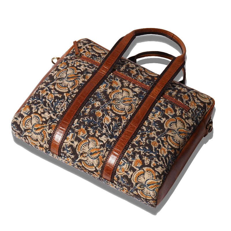 Patterned bag with brown accents on a white background