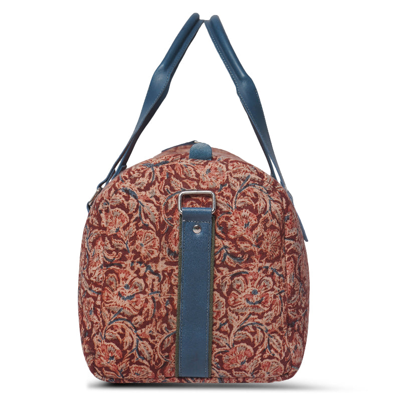 Patterned backpack with blue straps on a white background