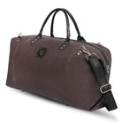 Brown leather duffel bag with black straps on a white background