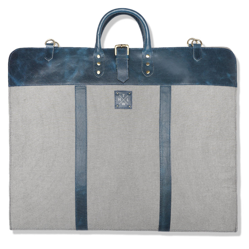Gray garment bag with blue accents and a visible brand logo on a white background