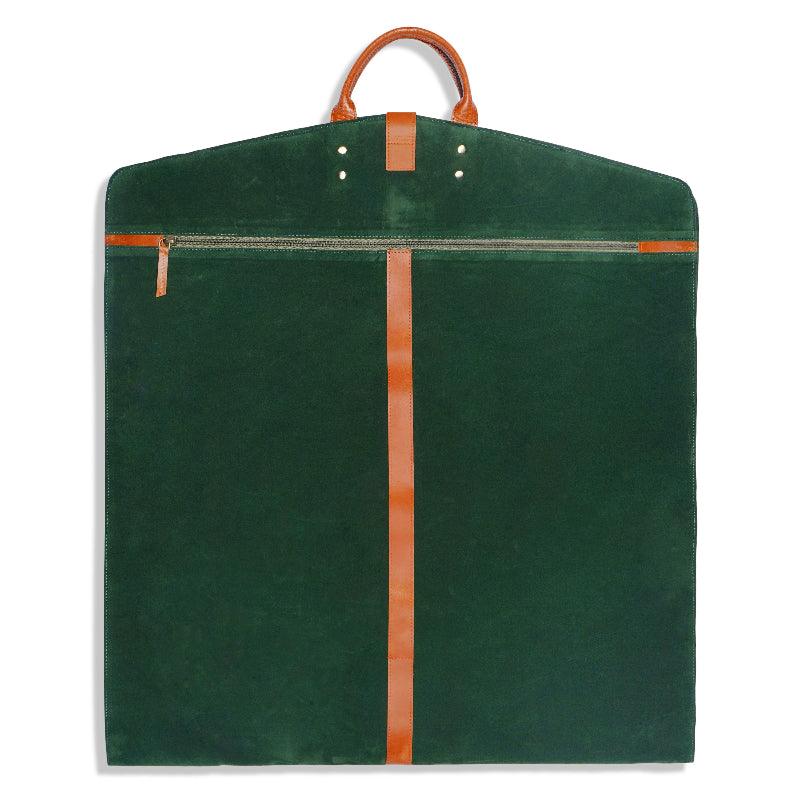 Green garment bag with brown leather straps on a white background