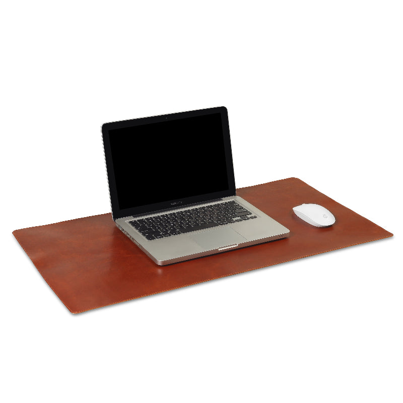 Laptop on a brown leather desk pad with a white mouse to the right on a white background