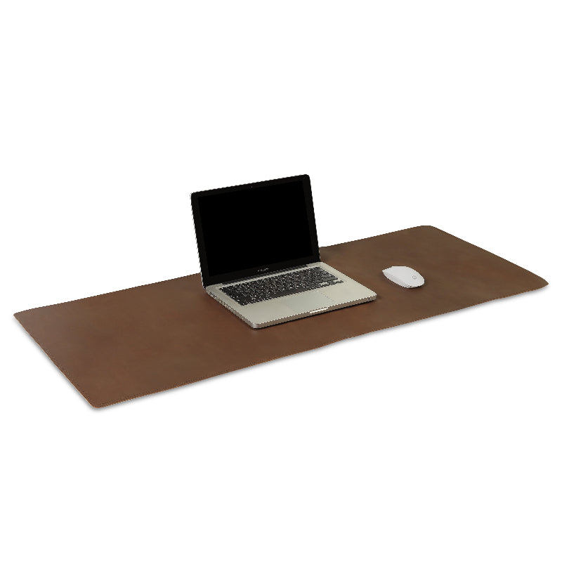 Brown leather desk pad with a laptop and mouse on a white background