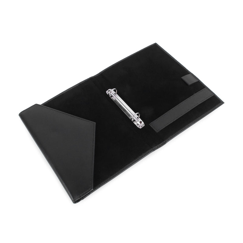 Black menu cover with a clip on a white background