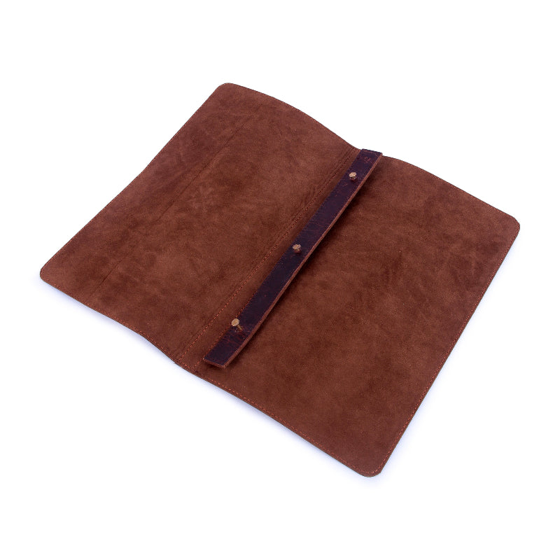 Brown suede tablet case with a strap on a white background