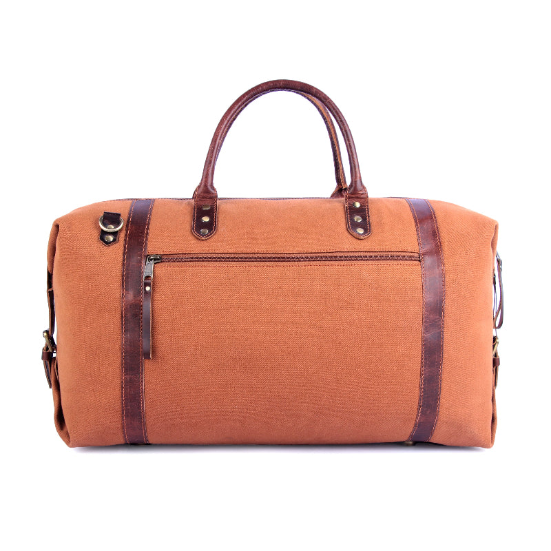Brown duffel bag with leather straps on a white background