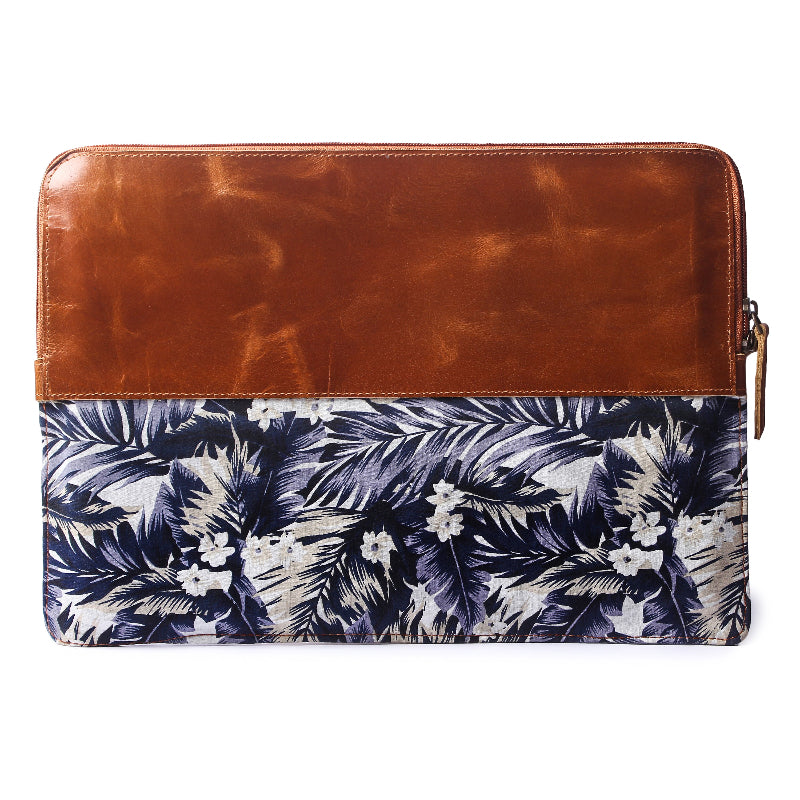 Leather and floral patterned sleeve on a white background