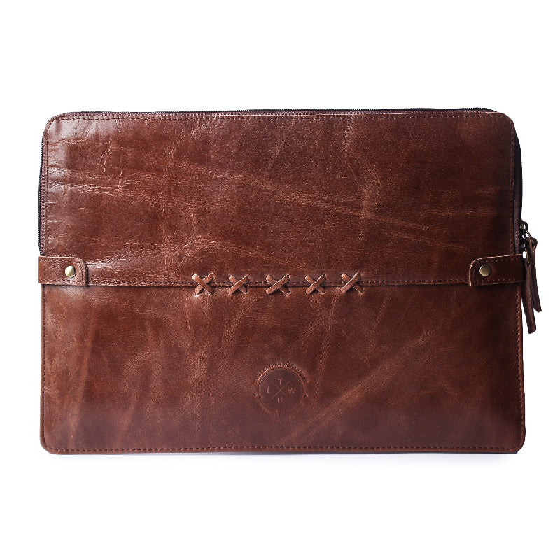Brown leather sleeve with stitching details on a white background