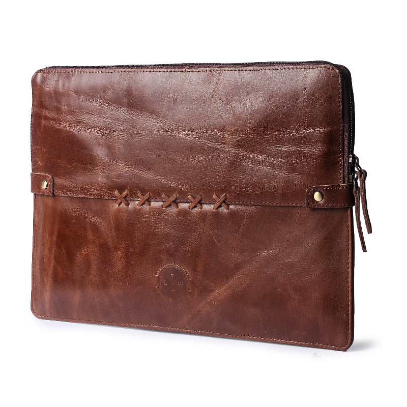 Brown genuine leather laptop sleeve with hand-stitched detailing and zipper closure from The Leather Warehouse.