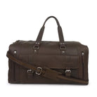 Brown leather duffel bag with multiple straps on a white background