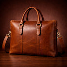 Brown leather briefcase on a wooden surface with a dark brown background