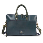 Front view of navy blue leather handbag with top handles.