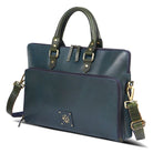 Angled front view of leather bag with shoulder strap.