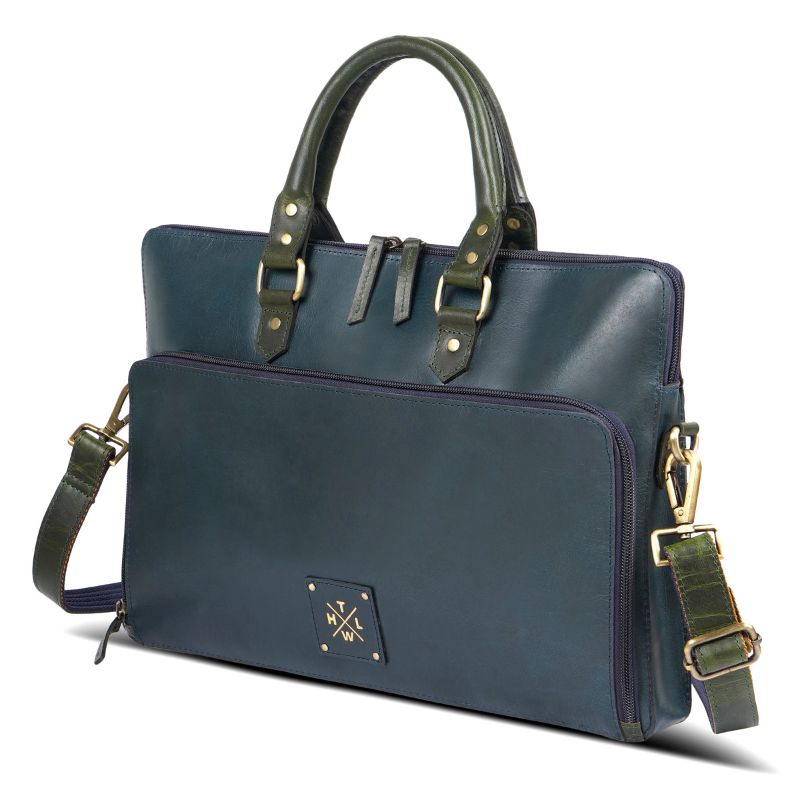 Angled front view of leather bag with shoulder strap.