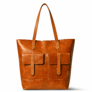 Brown leather tote bag with two front pockets on a white background