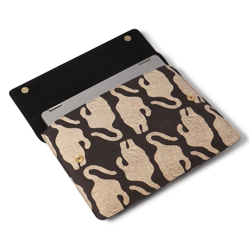 Laptop sleeve with tiger pattern on a white background