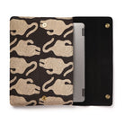 laptop sleeve with tiger -patterned a black interior for electronic device on a white background