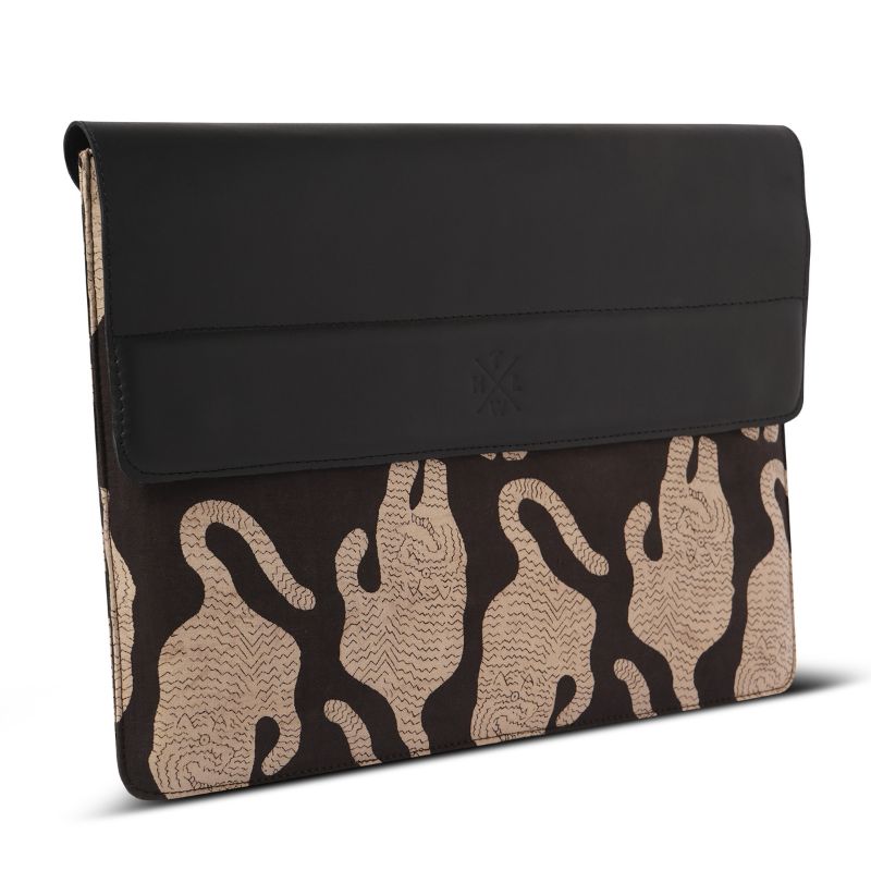 Black and brown  tiger patterned laptop sleeve on a white background