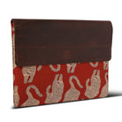 laptop sleeve with tiger pattern on a red background