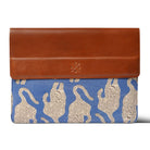 laptop sleeve bag with brown leather top and blue fabric with animal pattern