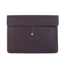 Dark brown leather envelope with a buckle on a white background