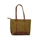 Green tote bag with brown leather accents on a white background