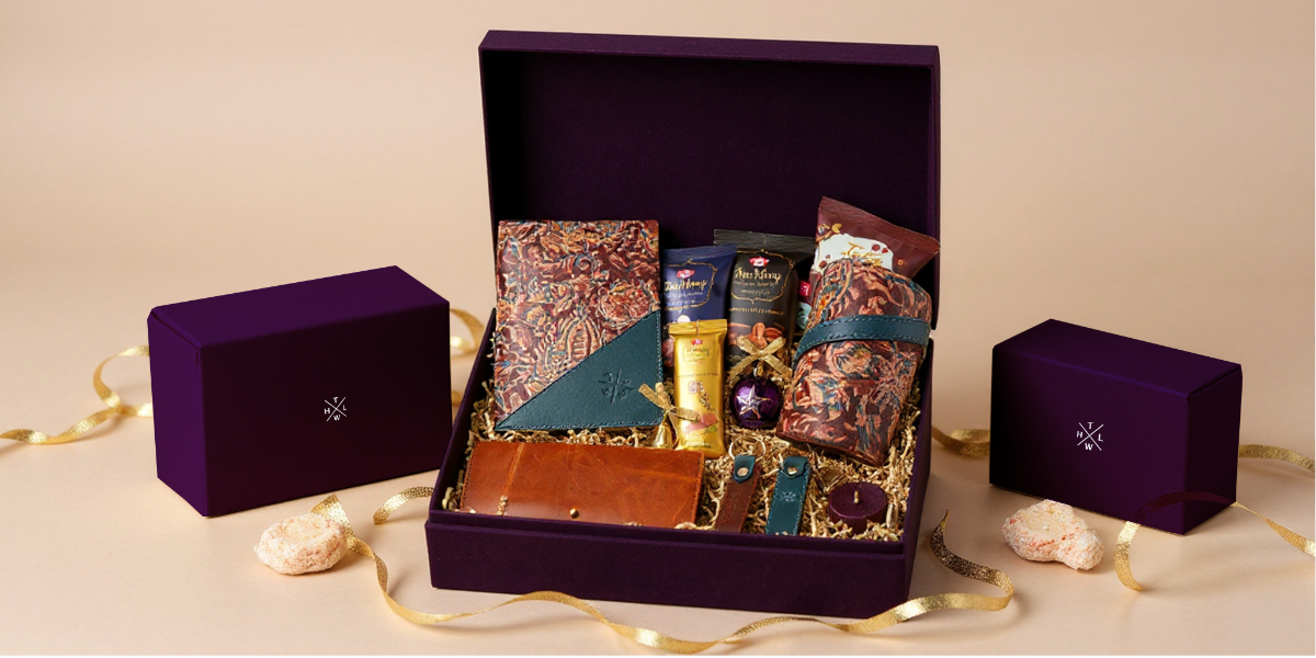 Luxury gift set with various items in a purple box on a beige background