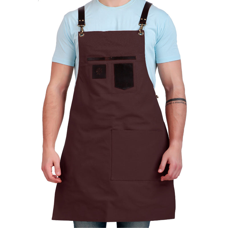 Person wearing a brown apron on a white background