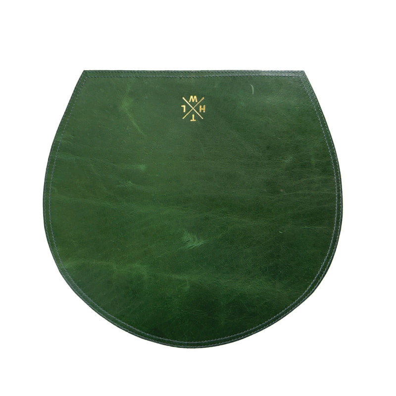 Green leather mat with a logo on a white background