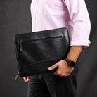 Man carrying Executive A4 Leather Folder 002 under his arm