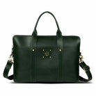Green leather laptop bag with a visible brand logo on a white background