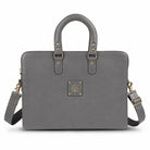 Gray leather laptop bag  with gold accents on a white background
